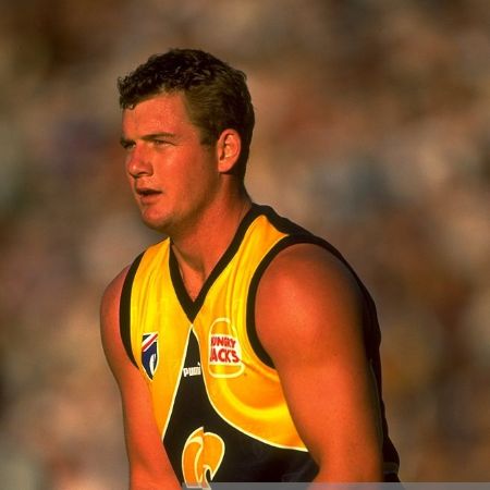 Scott in football jersey